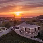 Villa windmill sunset